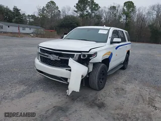 2018 Chevrolet Tahoe Commercial with VIN 1GNLCDEC0JR223125, listed as a IAAI auction lot 41540653 with 147,995 mi miles. Bid and sale history available at carsss.com. Image 2.
