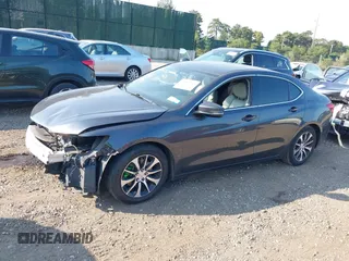2015 Acura TLX with VIN 19UUB1F31FA023293, listed as a IAAI auction lot 40310652 with 117,350 mi miles. Bid and sale history available at carsss.com. Image 2.
