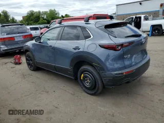 2022 Mazda CX-30 S Carbon Edition with VIN 3MVDMBCL7NM408036, listed as a Copart auction lot 56683665 with 82,337 mi miles and Salvage title. Bid and sale history available at DreamBid. Image 2.