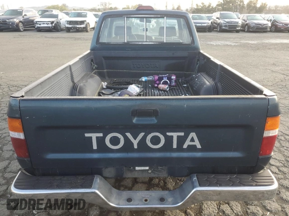 1994 Toyota Pickup z VIN 4TARN93P9RZ255143, wystawiony jako Copart lot #49554475 z przebiegiem 249 957 mil mil oraz Szkoda całkowita • Salvage title. Historia ofert i sprzedaży dostępna na DreamBid. Obrazek 6.