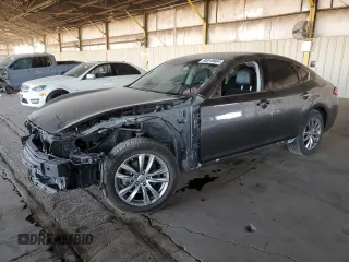 2018 Infiniti Q70 Luxe with VIN JN1BY1AR0JM220563, listed as a Copart auction lot 86910684 with 124,883 mi miles and Salvage title. Bid and sale history available at DreamBid. Image 1.