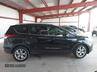 2015 Ford Escape Titanium with VIN 1FMCU0J98FUB95597, listed as a IAAI auction lot 41785188 with 84,141 mi miles. Bid and sale history available at carsss.com. Image 12.