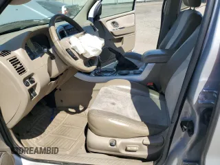 2005 Mercury Mariner Luxury z VIN 4M2YU56165DJ21260, wystawiony jako Copart lot #67528354 z przebiegiem Nie podano mil oraz Szkoda całkowita • Salvage title. Historia ofert i sprzedaży dostępna na DreamBid. Obrazek 7.