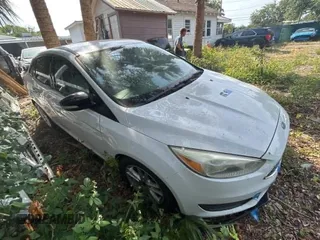 2015 Ford Focus SE with VIN 1FADP3F21FL338821, listed as a Copart auction lot 62089035 with 84,648 mi miles and Salvage title. Bid and sale history available at DreamBid. Image 1.