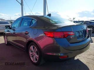 2013 Acura ILX Hybrid Technology z VIN 19VDE3F71DE300659, wystawiony jako IAAI lot #41754346 z przebiegiem 84 061 mil mil oraz . Historia ofert i sprzedaży dostępna na DreamBid. Obrazek 3.