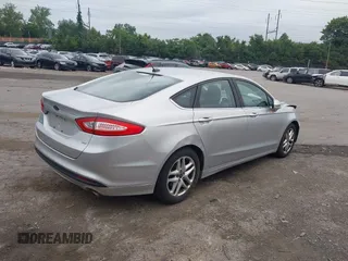 2015 Ford Fusion SE with VIN 3FA6P0H77FR210715, listed as a IAAI auction lot 42607234 with 141,794 mi miles and . Bid and sale history available at DreamBid. Image 4.