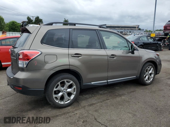 2018 Subaru Forester Touring with VIN JF2SJAWC9JH570189, listed as a Copart auction lot 57940935 with 76,574 mi miles and Salvage title. Bid and sale history available at DreamBid. Image 3.