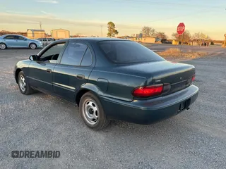 1993 Geo Prizm z VIN 1Y1SK5365PZ054069, wystawiony jako Copart lot #84108844 z przebiegiem 82 611 mil mil oraz Tytuł czysty. Historia ofert i sprzedaży dostępna na DreamBid. Obrazek 3.