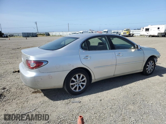 2002 Lexus ES 300 with VIN JTHBF30G920050886, listed as a Copart auction lot 57087355 with 131,304 mi miles and Salvage title. Bid and sale history available at DreamBid. Image 3.