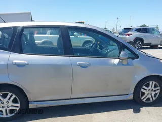 2007 Honda Fit Sport with VIN JHMGD38637S067718, listed as a IAAI auction lot 42348751 with 135,198 mi miles and . Bid and sale history available at DreamBid. Image 13.