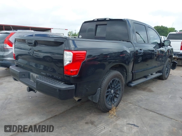 2018 Nissan Titan SV with VIN 1N6AA1E58JN540046, listed as a IAAI auction lot 42342982 with 68,488 mi miles and . Bid and sale history available at DreamBid. Image 4.