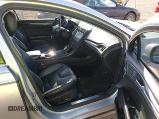 2013 Ford Fusion Titanium with VIN 3FA6P0K92DR200035, listed as a IAAI auction lot 42798129 with 242,831 mi miles and . Bid and sale history available at DreamBid. Image 5.