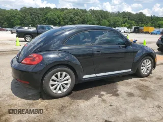 2015 Volkswagen Beetle Fleet Edition with VIN 3VWF17ATXFM645590, listed as a Copart auction lot 58234745 with 128,469 mi miles and Salvage title. Bid and sale history available at DreamBid. Image 3.