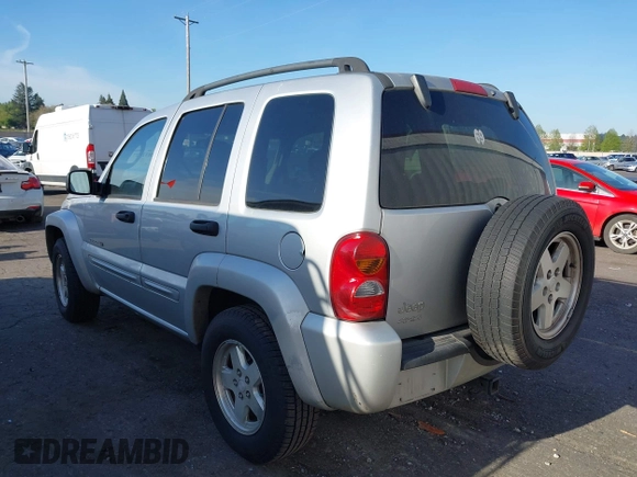 2003 Jeep Liberty Limited z VIN 1J8GL58K73W694818, wystawiony jako IAAI lot #42032227 z przebiegiem 217 446 mil mil oraz . Historia ofert i sprzedaży dostępna na DreamBid. Obrazek 3.