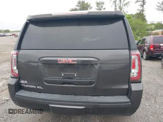 2015 GMC Yukon XL SLE z VIN 1GKS1GKC8FR507436, wystawiony jako IAAI lot #42113696 z przebiegiem Nie podano mil oraz . Historia ofert i sprzedaży dostępna na DreamBid. Obrazek 16.