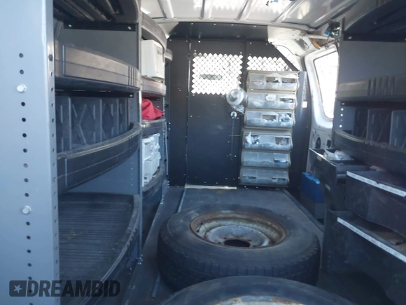 2005 Ford Econoline Cargo with VIN 1FTNE24L55HA27985, listed as a IAAI auction lot 41933293 with 63,486 mi miles. Bid and sale history available at carsss.com. Image 8.