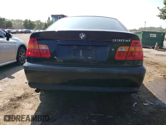 2003 BMW 3 Series 330xi with VIN WBAEW53413PG21999, listed as a Copart auction lot 60724374 with 137,242 mi miles and Salvage Title. Bid and sale history available at carsss.com. Image 6.