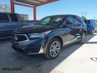2021 Acura RDX w/Technology Package with VIN 5J8TC1H54ML016041, listed as a IAAI auction lot 41855161 with 33,876 mi miles. Bid and sale history available at carsss.com. Image 17.