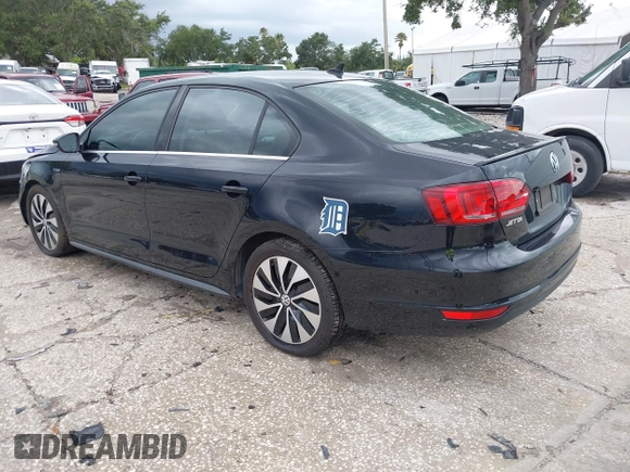 2013 Volkswagen Jetta Hybrid SE with VIN 3VW637AJ0DM281198, listed as a IAAI auction lot 42710130 with 68,068 mi miles and . Bid and sale history available at DreamBid. Image 3.