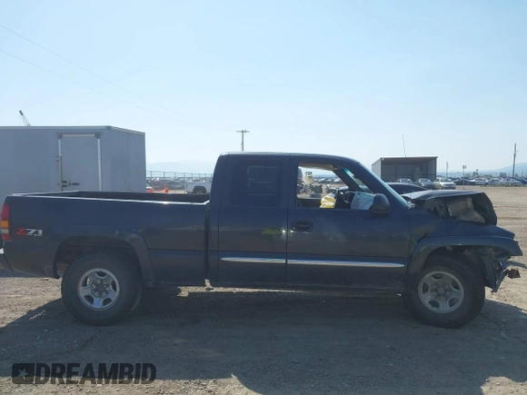 2003 GMC Sierra 1500 SLT z VIN 1GTEK19T03E191705, wystawiony jako IAAI lot #42145392 z przebiegiem Nie podano mil oraz . Historia ofert i sprzedaży dostępna na DreamBid. Obrazek 14.