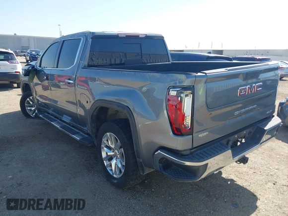 2019 GMC Sierra 1500 SLT z VIN 3GTP8DED7KG308047, wystawiony jako IAAI lot #41978970 z przebiegiem 112 662 mil mil oraz . Historia ofert i sprzedaży dostępna na DreamBid. Obrazek 3.