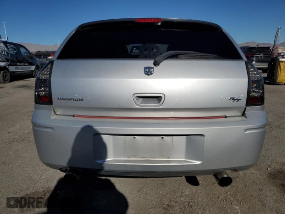 2006 Dodge Magnum R/T z VIN 2D8GV57286H122762, wystawiony jako Copart lot #83399984 z przebiegiem 200 443 mil mil oraz Szkody całkowita. Historia ofert i sprzedaży dostępna na DreamBid. Obrazek 6.