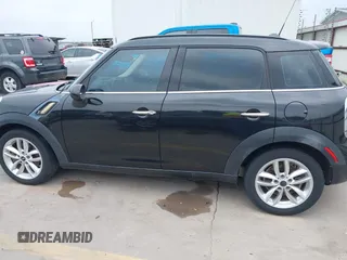 2014 MINI Countryman S z VIN WMWZC3C58EWT01074, wystawiony jako IAAI lot #42238095 z przebiegiem 83 252 mil mil oraz . Historia ofert i sprzedaży dostępna na DreamBid. Obrazek 14.