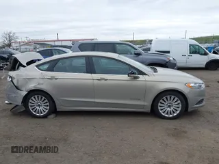 2015 Ford Fusion SE Hybrid with VIN 3FA6P0LU6FR210606, listed as a IAAI auction lot 42070466 with 123,043 mi miles and . Bid and sale history available at DreamBid. Image 14.