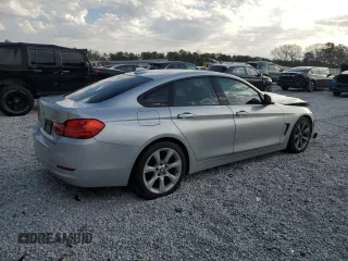2015 BMW 4 Series 428i with VIN WBA4A5C59FG051139, listed as a Copart auction lot 45186185 with 141,839 mi miles and Clean Title. Bid and sale history available at DreamBid. Image 3.