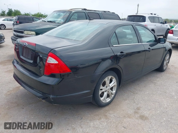 2012 Ford Fusion SE z VIN 3FAHP0HA4CR381213, wystawiony jako IAAI lot #42317783 z przebiegiem 193 816 mil mil oraz . Historia ofert i sprzedaży dostępna na DreamBid. Obrazek 4.
