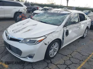 2015 Toyota Avalon Limited with VIN 4T1BK1EB0FU158712, listed as a IAAI auction lot 41436341 with 127,752 mi miles and . Bid and sale history available at DreamBid. Image 2.