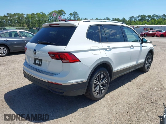 2024 Volkswagen Tiguan with VIN 3VVTB7AX9RM217926, listed as a IAAI auction lot 42339057 with 8,233 mi miles and . Bid and sale history available at DreamBid. Image 4.