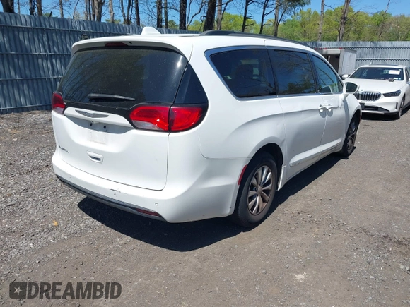 2017 Chrysler Pacifica Touring L with VIN 2C4RC1BG0HR821230, listed as a IAAI auction lot 42158120 with 98,354 mi miles and . Bid and sale history available at DreamBid. Image 4.