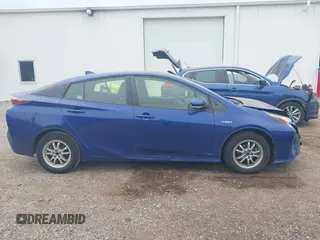 2016 Toyota Prius Two z VIN JTDKBRFU3G3511809, wystawiony jako IAAI lot #42295946 z przebiegiem 118 621 mil mil oraz . Historia ofert i sprzedaży dostępna na DreamBid. Obrazek 13.