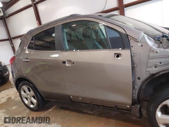 2013 Buick Encore Convenience with VIN KL4CJBSB9DB131484, listed as a IAAI auction lot 41727376 with 141,016 mi miles. Bid and sale history available at carsss.com. Image 14.
