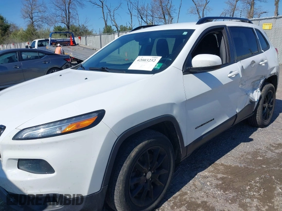 2014 Jeep Cherokee Latitude with VIN 1C4PJMCS9EW309289, listed as a IAAI auction lot 42003252 with 99,360 mi miles and . Bid and sale history available at DreamBid. Image 17.