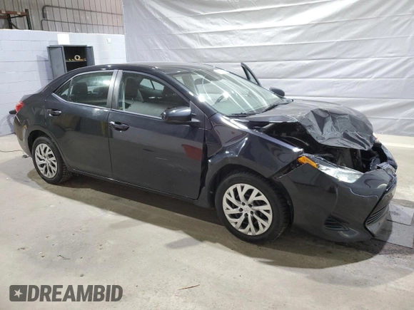 2019 Toyota Corolla L with VIN 2T1BURHE5KC185821, listed as a Copart auction lot 52613985 with 104,208 mi miles and Salvage title. Bid and sale history available at DreamBid. Image 4.