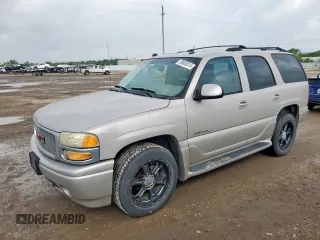 2004 GMC Yukon Denali z VIN 1GKEK63U84J298285, wystawiony jako Copart lot #59865815 z przebiegiem 168 414 mil mil oraz Czysty tytuł • Clean title. Historia ofert i sprzedaży dostępna na DreamBid. Obrazek 1.