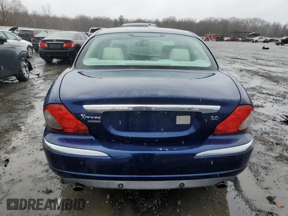 2004 Jaguar X-Type with VIN SAJEA51C74WE00833, listed as a Copart auction lot 49952155 with 109,254 mi miles and Non Repairable. Bid and sale history available at DreamBid. Image 6.
