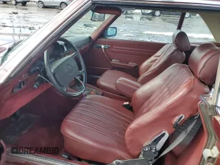 1986 Mercedes-Benz 560 SL with VIN WDBBA48D5GA051128, listed as a Copart auction lot 79873374 with 119,909 mi miles and Clean Title. Bid and sale history available at carsss.com. Image 7.
