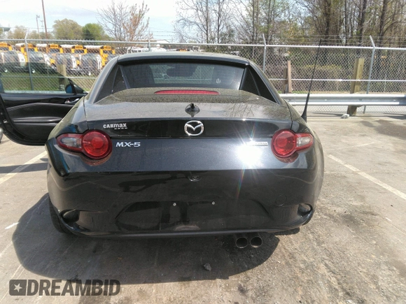 2021 Mazda MX-5 Miata Grand Touring z VIN JM1NDAM75M0451597, wystawiony jako IAAI lot #41932712 z przebiegiem 61 710 mil mil oraz . Historia ofert i sprzedaży dostępna na DreamBid. Obrazek 16.