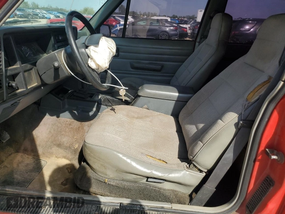 1995 Jeep Cherokee SE with VIN 1J4FT27P9SL561969, listed as a Copart auction lot 53295865 with 151,377 mi miles and Salvage title. Bid and sale history available at DreamBid. Image 7.