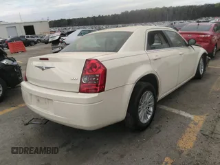 2009 Chrysler 300 LX with VIN 2C3KA43D79H554452, listed as a IAAI auction lot 38252211 with Not Provided miles and . Bid and sale history available at DreamBid. Image 4.