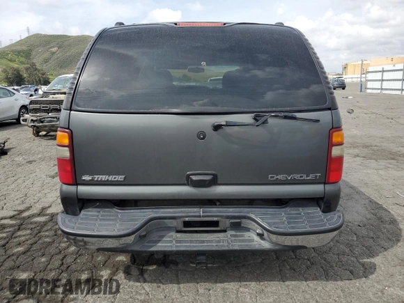 2002 Chevrolet Tahoe LS with VIN 1GNEC13T22R268336, listed as a Copart auction lot 50947675 with 238,425 mi miles and Salvage title. Bid and sale history available at DreamBid. Image 6.