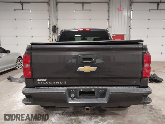 2016 Chevrolet Silverado 1500 LT with VIN 1GCVKREC0GZ303387, listed as a IAAI auction lot 41978237 with 123,692 mi miles and . Bid and sale history available at DreamBid. Image 16.