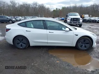 2023 Tesla Model 3 z VIN 5YJ3E1EA8PF671613, wystawiony jako IAAI lot #41737438 z przebiegiem 21 405 mil mil oraz . Historia ofert i sprzedaży dostępna na DreamBid. Obrazek 13.