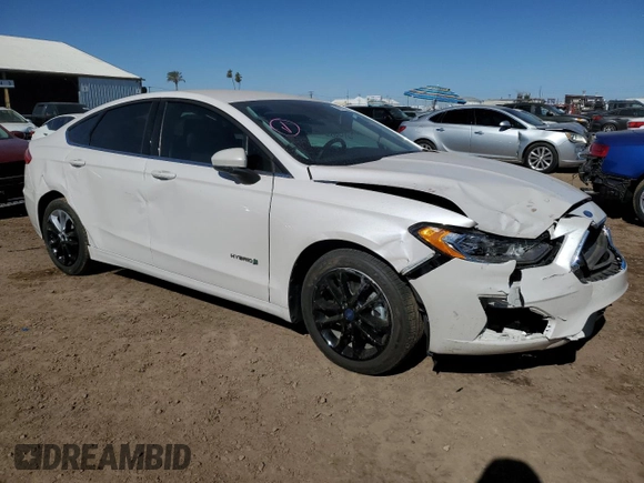 2019 Ford Fusion Hybrid SE with VIN 3FA6P0LU7KR284563, listed as a Copart auction lot 39979903 with 0 mi miles. Bid and sale history available at carsss.com. Image 4.