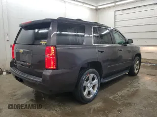 2017 Chevrolet Tahoe LS with VIN 1GNSCAKC5HR330860, listed as a Copart auction lot 49335545 with 136,681 mi miles and Clean title. Bid and sale history available at DreamBid. Image 3.