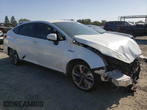 2018 Honda Clarity Touring z VIN JHMZC5F33JC002904, wystawiony jako Copart lot #55535325 z przebiegiem Nie podano mil oraz Szkoda całkowita • Salvage title. Historia ofert i sprzedaży dostępna na DreamBid. Obrazek 4.