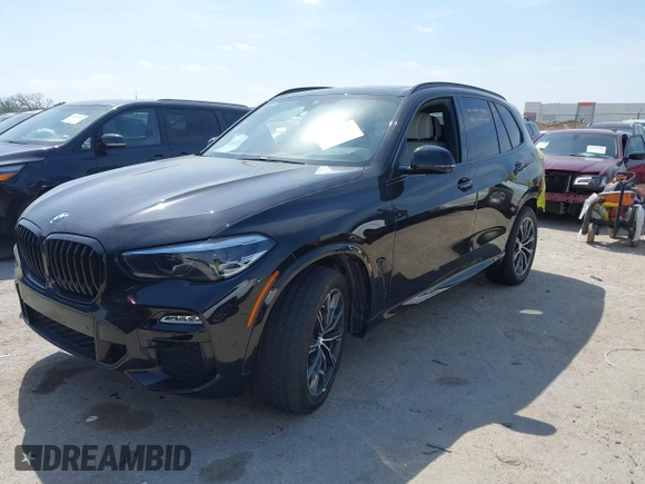 2021 BMW X5 xDrive40i with VIN 5UXCR6C01M9E66976, listed as a IAAI auction lot 42024110 with 67,877 mi miles and . Bid and sale history available at DreamBid. Image 2.